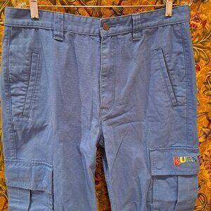Guess blue cargo pants with snap pockets and adjustable strings at ankles